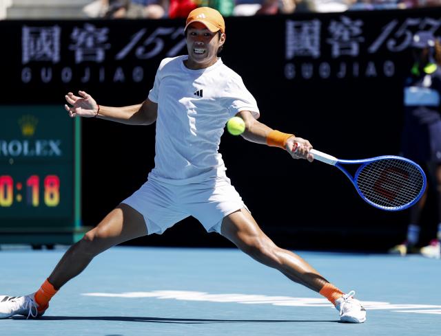 (260123) -- MELBOURNE, Jan. 23, 2026 (Xinhua) -- Learner Tien of the United States hits a return during the men's singles third round match against Nuno Borges of Portugal at the Australian Open 2026 tennis tournament in Melbourne, Australia, Jan. 23, 2026. (Xinhua/Ma Ping)