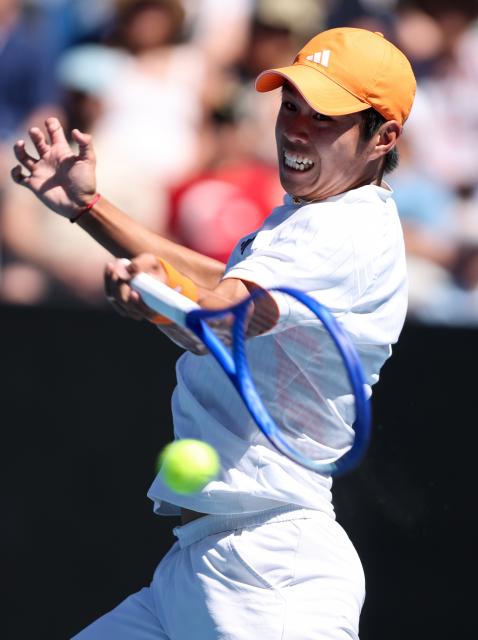 (260123) -- MELBOURNE, Jan. 23, 2026 (Xinhua) -- Learner Tien of the United States hits a return during the men's singles third round match against Nuno Borges of Portugal at the Australian Open 2026 tennis tournament in Melbourne, Australia, Jan. 23, 2026. (Xinhua/Ma Ping)