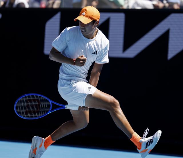 (260123) -- MELBOURNE, Jan. 23, 2026 (Xinhua) -- Learner Tien of the United States hits a return during the men's singles third round match against Nuno Borges of Portugal at the Australian Open 2026 tennis tournament in Melbourne, Australia, Jan. 23, 2026. (Xinhua/Ma Ping)