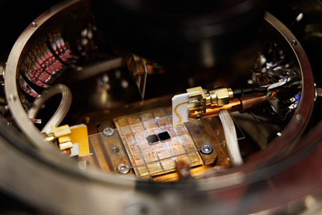 (260123) -- BEIJING, Jan. 23, 2026 (Xinhua) -- This photo taken on Jan. 21, 2026 shows a sample of ferroelectric capacitor waiting to be tested at a laboratory of the Institute of Physics at the Chinese Academy of Sciences, Beijing, capital of China. Chinese researchers recently made a breakthrough in ferroelectric materials that promises to dramatically increase information storage density. 
   The research team from the Institute of Physics at the Chinese Academy of Sciences, successfully identified one-dimensional charged domain walls within a fluorite-structured ferroelectric material. 
   These walls are tiny, with both thickness and width measuring just a few hundred-thousandths of the diameter of a human hair. This discovery, notably, provides a scientific basis for developing next-generation ultra-high-density devices.
   Their findings were on Friday published in the journal Science. (Xinhua/Jin Liwang)