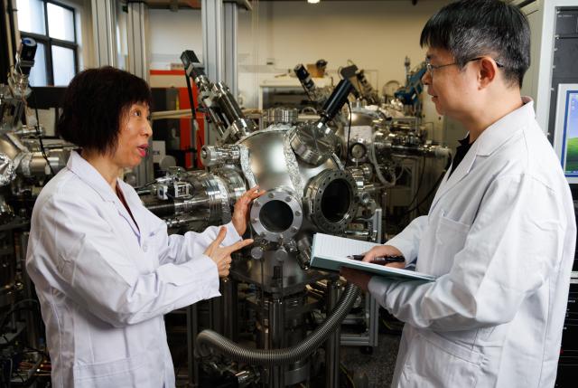 (260123) -- BEIJING, Jan. 23, 2026 (Xinhua) -- Researchers Jin Kuijuan (L) and Ge Chen discuss the experiment plan at a laboratory of the Institute of Physics at the Chinese Academy of Sciences, Beijing, capital of China, Jan. 21, 2026. Chinese researchers recently made a breakthrough in ferroelectric materials that promises to dramatically increase information storage density. 
   The research team from the Institute of Physics at the Chinese Academy of Sciences, successfully identified one-dimensional charged domain walls within a fluorite-structured ferroelectric material. 
   These walls are tiny, with both thickness and width measuring just a few hundred-thousandths of the diameter of a human hair. This discovery, notably, provides a scientific basis for developing next-generation ultra-high-density devices.
   Their findings were on Friday published in the journal Science. (Xinhua/Jin Liwang)