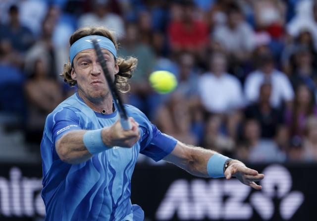 (260123) -- MELBOURNE, Jan. 23, 2026 (Xinhua) -- Andrey Rublev hits a return during the men's singles 3rd round match between Andrey Rublev of Russia and Francisco Cerundolo of Argentina at the Australian Open tennis tournament in Melbourne, Australia, Jan. 23, 2026. (Xinhua/Ma Ping)