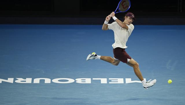 (260123) -- MELBOURNE, Jan. 23, 2026 (Xinhua) -- Alex de Minaur hits a return during the men's singles 3rd round match between Alex de Minaur of Australia and Frances Tiafoe of the United States at the Australian Open tennis tournament in Melbourne, Australia, Jan. 23, 2026. (Photo by Wang Shen/Xinhua)