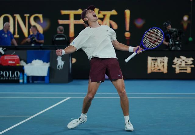 (260123) -- MELBOURNE, Jan. 23, 2026 (Xinhua) -- Alex de Minaur celebrates winning the men's singles 3rd round match between Alex de Minaur of Australia and Frances Tiafoe of the United States at the Australian Open tennis tournament in Melbourne, Australia, Jan. 23, 2026. (Photo by Wang Shen/Xinhua)