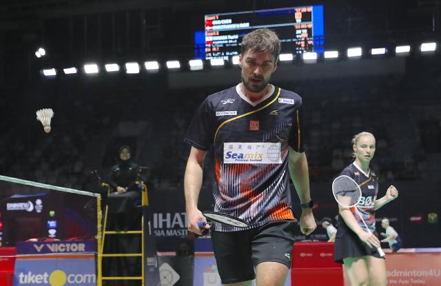 (260123) -- JAKARTA, Jan. 23, 2026 (Xinhua) -- Mathias Christiansen (L)/Alexandra Boje of Denmark compete during the mixed doubles quarterfinal match between Guo Xinwa/Chen Fanghui of China and Mathias Christiansen/Alexandra Boje of Denmark at the Indonesia Masters 2026 badminton tournament in Jakarta, Indonesia, Jan. 23, 2026. (Xinhua/Cen Yunpeng)