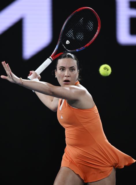 (260123) -- MELBOURNE, Jan. 23, 2026 (Xinhua) -- Elena-Gabriela Ruse hits a return during the women's singles 3rd round match between Elena-Gabriela Ruse of Romania and Mirra Andreeva of Russia at the Australian Open tennis tournament in Melbourne, Australia, Jan. 23, 2026. (Photo by Wang Shen/Xinhua)