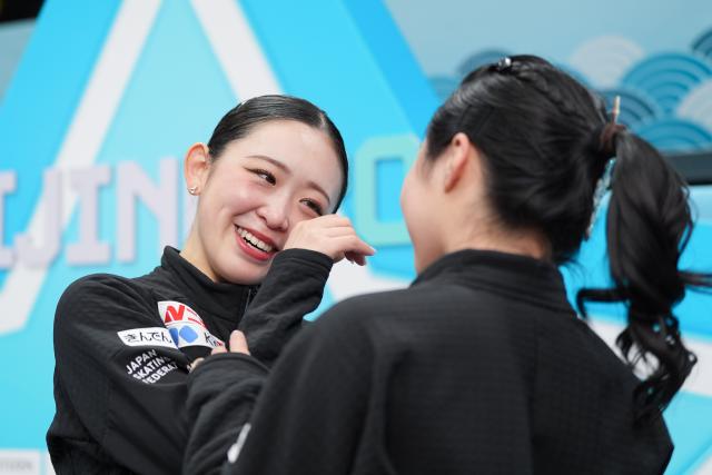 (260124) -- BEIJING, Jan. 24, 2026 (Xinhua) -- Aoki Yuna (L) of Japan reacts after the women's free skating at the ISU Four Continents Figure Skating Championships in Beijing, China, Jan. 23, 2026. (Xinhua/Xie Han)