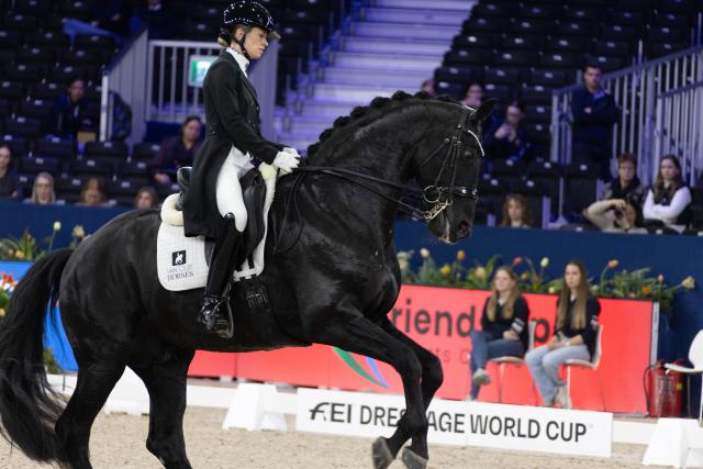 (260124) -- AMSTERDAM, Jan. 24, 2026 (Xinhua) -- Charlotte Fry of Britain rides her horse during the Federation Equestre International (FEI) Dressage World Cup at Jumping Amsterdam 2026 in Amsterdam, the Netherlands, Jan. 23, 2026. The 65th edition of Jumping Amsterdam, one of Europe's premier equestrian events, took place from Jan. 22 to 25 at the RAI Amsterdam Convention Centre. (Photo by Sylvia Lederer/Xinhua)