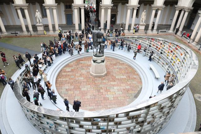 (260124) -- MILAN, Jan. 24, 2026 (Xinhua) -- People visit the exhibit at Pinacoteca di Brera during 2025 Milano Design Week in Milan, Italy, April 13, 2025. The 2026 Milan-Cortina Olympic Winter Games will run from February 6 to 22. (Xinhua/Li Jing)