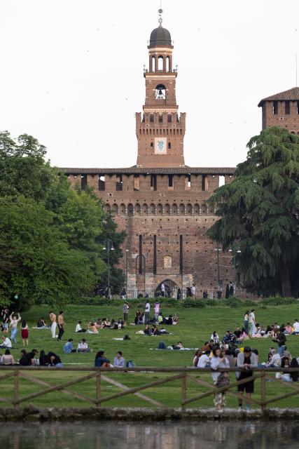 (260124) -- MILAN, Jan. 24, 2026 (Xinhua) -- People take a rest in Sempione Park in Milan, Italy, May 3, 2025. The 2026 Milan-Cortina Olympic Winter Games will run from February 6 to 22. (Xinhua/Li Jing)