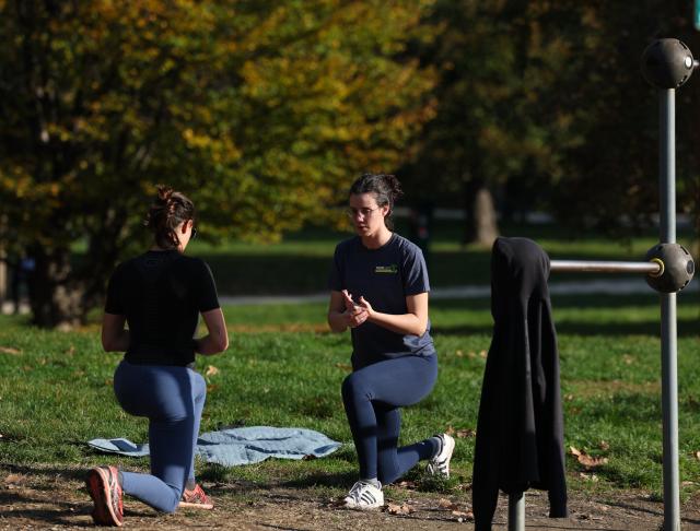 (260124) -- MILAN, Jan. 24, 2026 (Xinhua) -- People work out at the Sempione Park in Milan, Italy, Nov. 5, 2025. The 2026 Milan-Cortina Olympic Winter Games will run from February 6 to 22. (Xinhua/Li Jing)