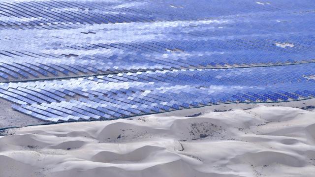 (260124) -- ERDOS, Jan. 24, 2026 (Xinhua) -- An aerial drone photo taken on May 17, 2025 shows a photovoltaic base with a capacity of one million kilowatts in Dalad Banner of Erdos, north China's Inner Mongolia Autonomous Region. TO GO WITH "Economic Watch: Prairie wind propels green computing power development in north China" (Photo by Yang Yaozhong/Xinhua)