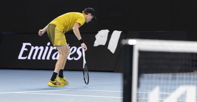 (260124) -- MELBOURNE, Jan. 24, 2026 (Xinhua) -- Jannik Sinner of Italy cramps during the men's singles 3rd round match between Jannik Sinner of Italy and Eliot Spizzirri of the United States at the Australian Open tennis tournament in Melbourne, Australia, Jan. 24, 2026. (Photo by Hu Jingchen/Xinhua)