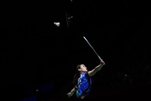 (260124) -- JAKARTA, Jan. 24, 2026 (Xinhua) -- Okuhara Nozomi of Japan returns the shuttlecock during the women's singles semifinal match against Chen Yufei of China at the Indonesia Masters 2026 badminton tournament in Jakarta, Indonesia, Jan. 24, 2026. (Xinhua/Veri Sanovri)