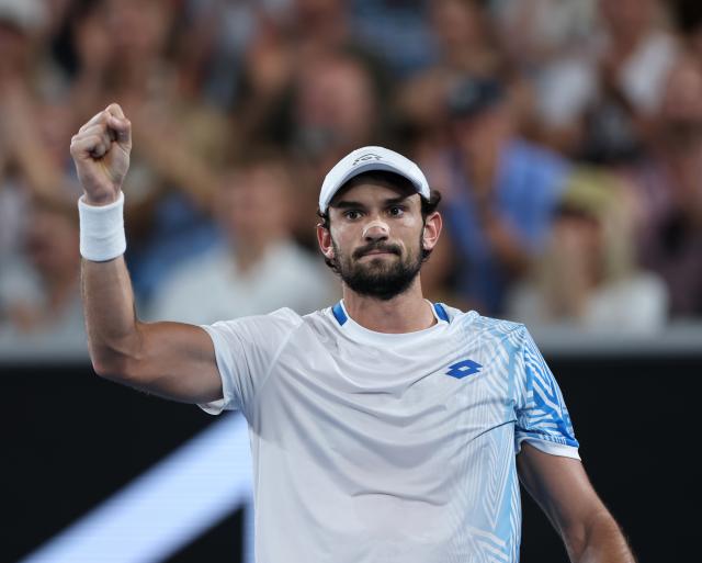 (260124) -- MELBOURNE, Jan. 24, 2026 (Xinhua) -- Valentin Vacherot of Monaco celebrates after scoring during the men's singles 3rd round match against Ben Shelton of the United States at the Australian Open 2026 tennis tournament in Melbourne, Australia, Jan. 24, 2026. (Xinhua/Ma Ping)