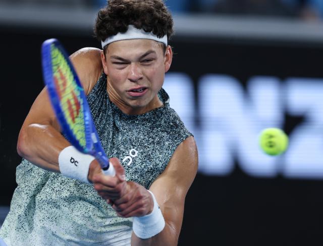 (260124) -- MELBOURNE, Jan. 24, 2026 (Xinhua) -- Ben Shelton of the United States hits a return during the men's singles 3rd round match against Valentin Vacherot of Monaco at the Australian Open 2026 tennis tournament in Melbourne, Australia, Jan. 24, 2026. (Xinhua/Ma Ping)