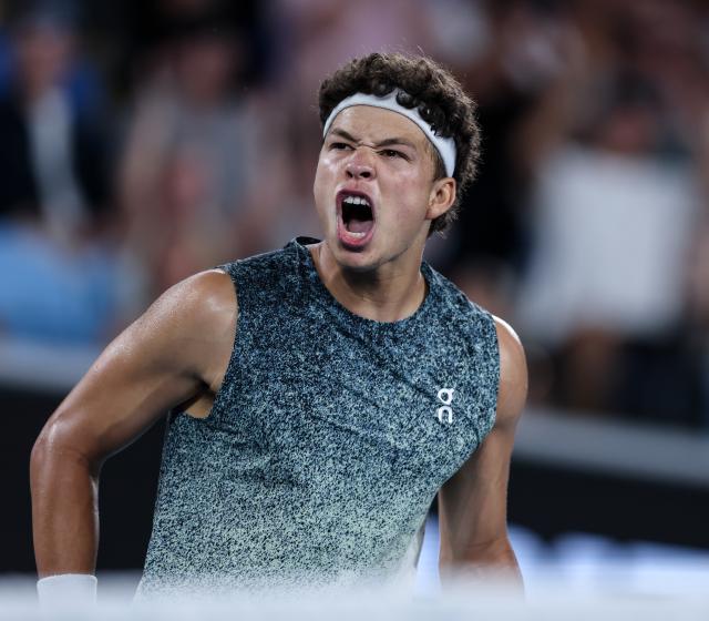 (260124) -- MELBOURNE, Jan. 24, 2026 (Xinhua) -- Ben Shelton of the United States reacts during the men's singles 3rd round match against Valentin Vacherot of Monaco at the Australian Open 2026 tennis tournament in Melbourne, Australia, Jan. 24, 2026. (Xinhua/Ma Ping)
