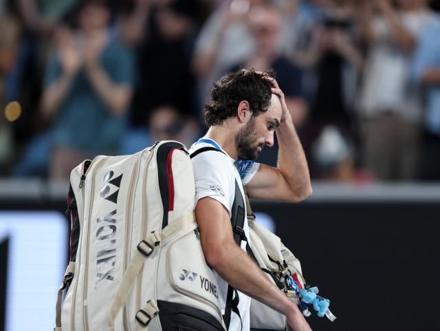 (260124) -- MELBOURNE, Jan. 24, 2026 (Xinhua) -- Valentin Vacherot of Monaco leaves the court after the men's singles 3rd round match against Ben Shelton of the United States at the Australian Open 2026 tennis tournament in Melbourne, Australia, Jan. 24, 2026. (Xinhua/Ma Ping)