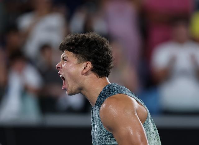 (260124) -- MELBOURNE, Jan. 24, 2026 (Xinhua) -- Ben Shelton of the United States celebrates after winning the men's singles 3rd round match against Valentin Vacherot of Monaco at the Australian Open 2026 tennis tournament in Melbourne, Australia, Jan. 24, 2026. (Xinhua/Ma Ping)