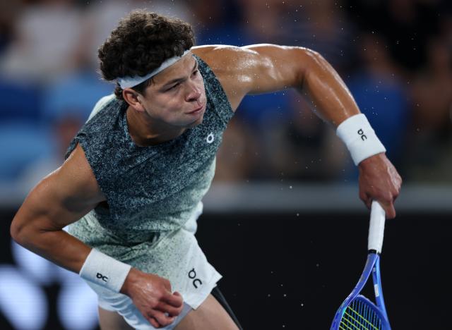 (260124) -- MELBOURNE, Jan. 24, 2026 (Xinhua) -- Ben Shelton of the United States serves during the men's singles 3rd round match against Valentin Vacherot of Monaco at the Australian Open 2026 tennis tournament in Melbourne, Australia, Jan. 24, 2026. (Xinhua/Ma Ping)
