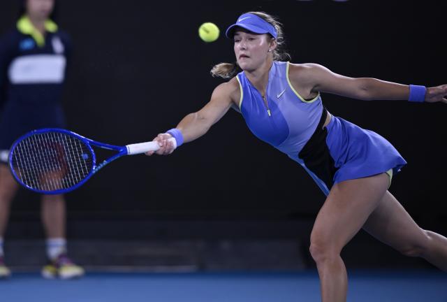 (260124) -- MELBOURNE, Jan. 24, 2026 (Xinhua) -- Anna Kalinskaya hits a return during the women's singles 3rd round match between Iga Swiatek of Poland and Anna Kalinskaya of Russia at the Australian Open tennis tournament in Melbourne, Australia, Jan. 24, 2026. (Photo by Wang Shen/Xinhua)