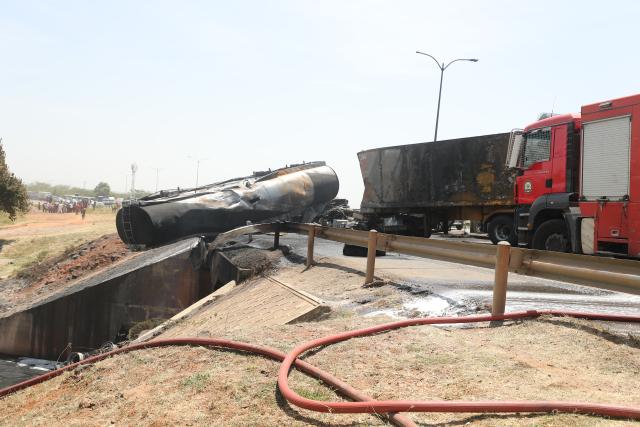 (260124) -- NAIROBI, Jan. 24, 2026 (Xinhua) -- This photo taken on Jan. 24, 2026 shows the site of an oil tanker explosion in Nairobi, the capital of Kenya. At least one person killed after an oil tanker collided with a truck and exploded on a road near Wilson Airport in Nairobi, Kenya, local media reported. (Photo by Henry Naminde/Xinhua)
