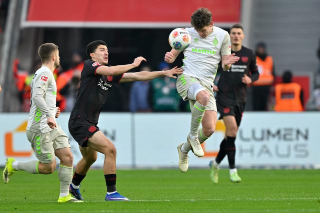 (260125) -- LEVERKUSEN, Jan. 25, 2026 (Xinhua) -- Ibrahim Maza (C) of Bayer 04 Leverkusen vies with Jens Stage (R) of SV Werder Bremen during the German first division Bundesliga football match between Bayer 04 Leverkusen and SV Werder Bremen in Leverkusen, Germany, Jan. 24, 2026. (Photo by Ulrich Hufnagel/Xinhua)