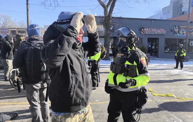 (260125) -- MINNEAPOLIS, Jan. 25, 2026 (Xinhua) -- This photo taken with a mobile phone shows people attending a protest in Minneapolis, Minnesota, the United States, on Jan. 24, 2026. A man was shot and killed by federal agents in Minneapolis, the largest city in the U.S. state of Minnesota, on Saturday morning, authorities said.
   This incident marks the third shooting involving federal law enforcement officers in the city this month. (Xinhua)
