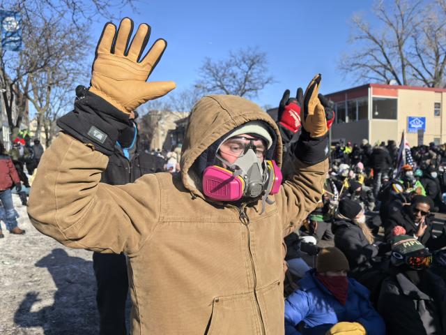 (260125) -- MINNEAPOLIS, Jan. 25, 2026 (Xinhua) -- This photo taken with a mobile phone shows people attending a protest in Minneapolis, Minnesota, the United States, on Jan. 24, 2026. A man was shot and killed by federal agents in Minneapolis, the largest city in the U.S. state of Minnesota, on Saturday morning, authorities said.
   This incident marks the third shooting involving federal law enforcement officers in the city this month. (Xinhua)