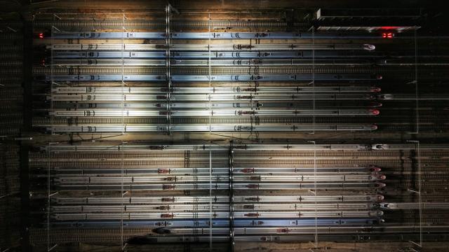 (260125) -- KUNMING, Jan. 25, 2026 (Xinhua) -- An aerial drone photo taken on Jan. 25, 2026 shows the bullet trains at a depot in Kunming, southwest China's Yunnan Province. A new train schedule will be put into effect in China from Jan. 26. 2026. (Photo by Yang Zixuan/Xinhua)