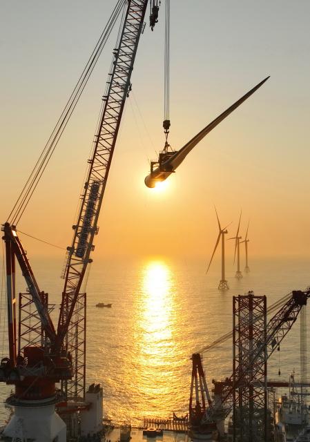 (260125) -- BEIJING, Jan. 25, 2026 (Xinhua) -- A drone photo taken on Jan. 13, 2026 shows one of the turbine blades being hoisted at the construction site of a 20-megawatt offshore wind turbine unit in the coastal waters of southeast China's Fujian Province. China is the undisputed global powerhouse in wind energy. From the Gobi to the sea, wind power forms a cornerstone of the country's transition toward a cleaner and more sustainable development model.
   For 15 consecutive years, China has ranked first worldwide in installed wind power capacity. By the end of November 2025, its total installed capacity had exceeded 600 million kilowatts, far exceeding that of any other nation, official data show.
   With vast onshore wind farms across its northern and western regions and rapidly expanding offshore projects along the eastern coastline, China's wind energy not only provides clean electricity to millions of households but also plays a crucial role in reducing carbon emissions.
   Beyond its borders, China has actively shared its green achievements. During the 2021-2025 period, the wind power and photovoltaic products China exported helped reduce around 4.1 billion tons of carbon emissions in other countries, official data show.
   Bolstered by the world's largest renewable energy system, ongoing technological innovation and strong policy support, China is poised to continue international cooperation in advancing the global transition to a green, low-carbon future, contributing to the shared vision of a clean and beautiful world. (Xinhua/Lin Shanchuan)