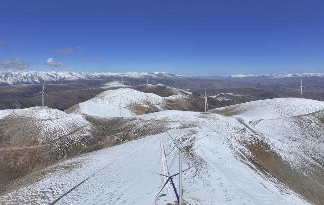 (260125) -- BEIJING, Jan. 25, 2026 (Xinhua) -- An aerial drone photo taken on Oct. 22, 2024 shows a view of the wind farm project with the highest nacelle at an altitude of 5,305 meters in Baxoi County, southwest China's Xizang Autonomous Region. China is the undisputed global powerhouse in wind energy. From the Gobi to the sea, wind power forms a cornerstone of the country's transition toward a cleaner and more sustainable development model.
   For 15 consecutive years, China has ranked first worldwide in installed wind power capacity. By the end of November 2025, its total installed capacity had exceeded 600 million kilowatts, far exceeding that of any other nation, official data show.
   With vast onshore wind farms across its northern and western regions and rapidly expanding offshore projects along the eastern coastline, China's wind energy not only provides clean electricity to millions of households but also plays a crucial role in reducing carbon emissions.
   Beyond its borders, China has actively shared its green achievements. During the 2021-2025 period, the wind power and photovoltaic products China exported helped reduce around 4.1 billion tons of carbon emissions in other countries, official data show.
   Bolstered by the world's largest renewable energy system, ongoing technological innovation and strong policy support, China is poised to continue international cooperation in advancing the global transition to a green, low-carbon future, contributing to the shared vision of a clean and beautiful world. (Photo by Song Xianji/Xinhua)