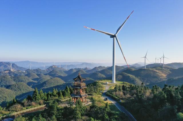 (260125) -- BEIJING, Jan. 25, 2026 (Xinhua) -- An aerial drone photo taken on Oct. 28, 2025 shows a wind power project in operation in Wolong County, Shizhu Tujia Autonomous County, southwest China's Chongqing. China is the undisputed global powerhouse in wind energy. From the Gobi to the sea, wind power forms a cornerstone of the country's transition toward a cleaner and more sustainable development model.
   For 15 consecutive years, China has ranked first worldwide in installed wind power capacity. By the end of November 2025, its total installed capacity had exceeded 600 million kilowatts, far exceeding that of any other nation, official data show.
   With vast onshore wind farms across its northern and western regions and rapidly expanding offshore projects along the eastern coastline, China's wind energy not only provides clean electricity to millions of households but also plays a crucial role in reducing carbon emissions.
   Beyond its borders, China has actively shared its green achievements. During the 2021-2025 period, the wind power and photovoltaic products China exported helped reduce around 4.1 billion tons of carbon emissions in other countries, official data show.
   Bolstered by the world's largest renewable energy system, ongoing technological innovation and strong policy support, China is poised to continue international cooperation in advancing the global transition to a green, low-carbon future, contributing to the shared vision of a clean and beautiful world. (Photo by Li Xiaofeng/Xinhua)