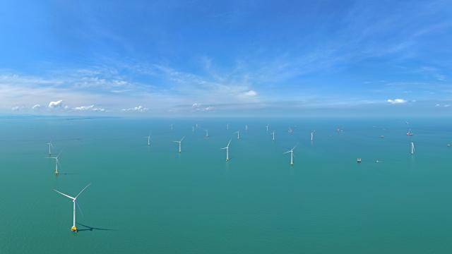 (260125) -- BEIJING, Jan. 25, 2026 (Xinhua) -- An aerial drone photo taken on May 21, 2024 shows the construction site of a wind farm off the coast of Fangchenggang, south China's Guangxi Zhuang Autonomous Region. China is the undisputed global powerhouse in wind energy. From the Gobi to the sea, wind power forms a cornerstone of the country's transition toward a cleaner and more sustainable development model.
   For 15 consecutive years, China has ranked first worldwide in installed wind power capacity. By the end of November 2025, its total installed capacity had exceeded 600 million kilowatts, far exceeding that of any other nation, official data show.
   With vast onshore wind farms across its northern and western regions and rapidly expanding offshore projects along the eastern coastline, China's wind energy not only provides clean electricity to millions of households but also plays a crucial role in reducing carbon emissions.
   Beyond its borders, China has actively shared its green achievements. During the 2021-2025 period, the wind power and photovoltaic products China exported helped reduce around 4.1 billion tons of carbon emissions in other countries, official data show.
   Bolstered by the world's largest renewable energy system, ongoing technological innovation and strong policy support, China is poised to continue international cooperation in advancing the global transition to a green, low-carbon future, contributing to the shared vision of a clean and beautiful world. (Xinhua/Zhou Hua)