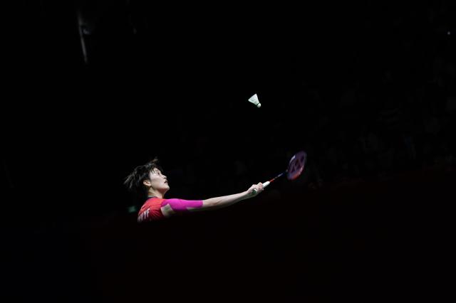 (260125) -- JAKARTA, Jan. 25, 2026 (Xinhua) -- Chen Yufei hits a return during the women's singles final match against Pitchamon Opatniputh of Thailand at the Indonesia Masters 2026 badminton tournament in Jakarta, Indonesia, Jan. 25, 2026. (Xinhua/Veri Sanovri)