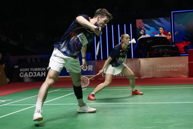 (260125) -- JAKARTA, Jan. 25, 2026 (Xinhua) -- Mathias Christiansen (L)/Alexandra Boje compete during the mixed doubles final match between Chen Tang Jie/Toh Ee Wei of Malaysia and Mathias Christiansen/Alexandra Boje of Denmark at the Indonesia Masters 2026 badminton tournament in Jakarta, Indonesia, Jan. 25, 2026. (Xinhua/Veri Sanovri)