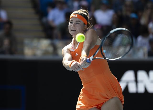 (260125) -- MELBOURNE, Jan. 25, 2026 (Xinhua) -- Karolina Muchova hits a return during the women's singles 4th round match between Coco Gauff of the United States and Karolina Muchova of the Czech Republic at the Australian Open tennis tournament in Melbourne, Australia, Jan. 25, 2026. (Photo by Hu Jingchen/Xinhua)