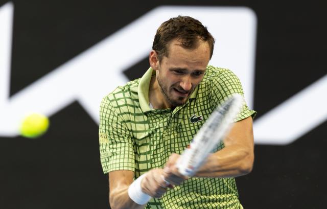 (260125) -- MELBOURNE, Jan. 25, 2026 (Xinhua) -- Daniil Medvedev hits a return during the men's singles 4th round match between Daniil Medvedev of Russia and Learner Tien of the United States at the Australian Open tennis tournament in Melbourne, Australia, Jan. 25, 2026. (Photo by Hu Jingchen/Xinhua)