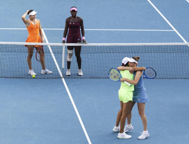 (260125) -- MELBOURNE, Jan. 25, 2026 (Xinhua) -- Elise Mertens (front R)/Zhang Shuai (front L) celebrate winning the women's doubles 2nd round match between Elise Mertens (Belgium)/Zhang Shuai (China) and Iva Jovic (the United States)/Victoria Mboko (Canada) at the Australian Open tennis tournament in Melbourne, Australia, Jan. 25, 2026. (Photo by Hu Jingchen/Xinhua)