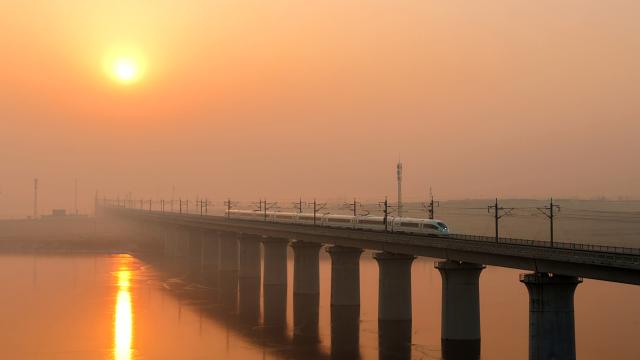 (260125) -- BEIJING, Jan. 25, 2026 (Xinhua) -- A drone photo taken on Jan. 25, 2026 shows a bullet train running in Pingyi County of Linyi City, east China's Shandong Province. A new train schedule will be put into effect in China from Jan. 26. 2026. (Photo by Wu Jiquan/Xinhua)