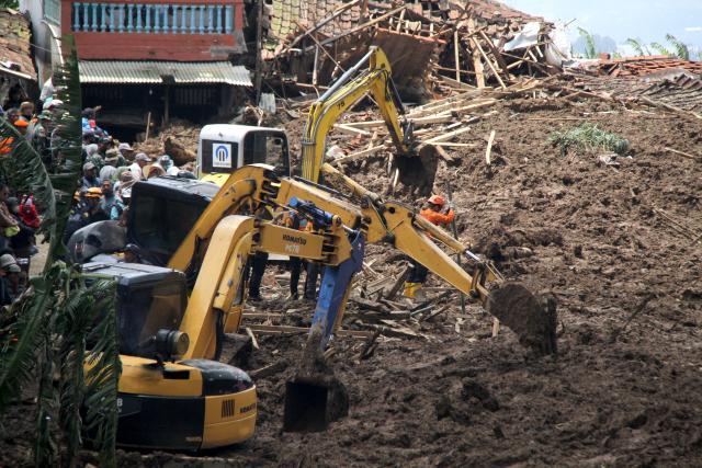 (260125) -- WEST BANDUNG, Jan. 25, 2026 (Xinhua) -- Rescuers work on-site after a landslide struck West Bandung Regency, West Java, Indonesia, Jan. 25, 2026. Indonesian police have recovered 16 bodies following a landslide in West Java Province, with seven victims identified, a police spokesperson said on Saturday. (Photo by Septianjar Muharam/Xinhua)