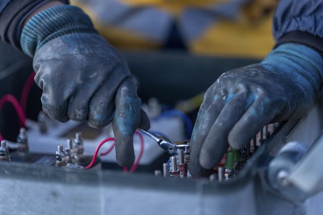 (260125) -- NAGQU, Jan. 25, 2026 (Xinhua) -- A worker checks the internal wiring of a track circuit box in Amdo County, Nagqu, southwest China's Xizang Autonomous Region, Jan. 23, 2026. Perched at an altitude of 4,886 meters, the Za'gya Zangbo signal maintenance section in Amdo County is the world's highest railway signal maintenance section. Fierce winds and bitter cold prevail in the area, where temperatures often drop below minus 30 degrees Celsius.
   Since its establishment in 2018, the section has been responsible for maintaining and repairing signal equipment at three high-altitude stations -- Tanggula South, Za'gya Zangbo and Xuechama. Ten young workers from various ethnic groups, including the Han, Tibetan and Mongolian, are currently on duty here. With an average age of under 32, they brave extreme conditions to keep the railway operating safely, ensuring the smooth flow of trains during the upcoming Spring Festival travel rush and the long term. (Xinhua/Tenzing Nima Qadhup)