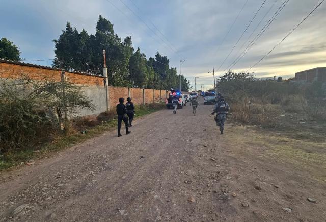 (260126) -- SALAMANCA, Jan. 26, 2026 (Xinhua) -- Security personnel patrol near the soccer field where a shooting occurred in Salamanca, Mexico, on Jan. 25, 2026. Gunmen opened fire during an amateur soccer match in central Mexico on Sunday, killing at least 11 people and wounding 12 others, local authorities said.
   The attack occurred around 5:20 p.m. local time (2320 GMT) at a soccer field in the Loma de Flores community in Salamanca, in the central state of Guanajuato. Witnesses said several armed men arrived in two pickup trucks, got out, and fired indiscriminately at players and spectators. (Xinhua)