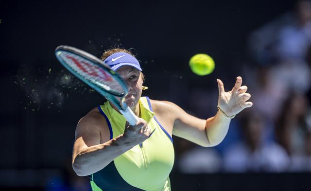 (260126) -- MELBOURNE, Jan. 26, 2026 (Xinhua) -- Amanda Anisimova of the United States hits a return during the women's singles 4th round match between Wang Xinyu of China and Amanda Anisimova of the United States at the Australian Open tennis tournament in Melbourne, Australia, Jan. 26, 2026. (Photo by Hu Jingchen/Xinhua)