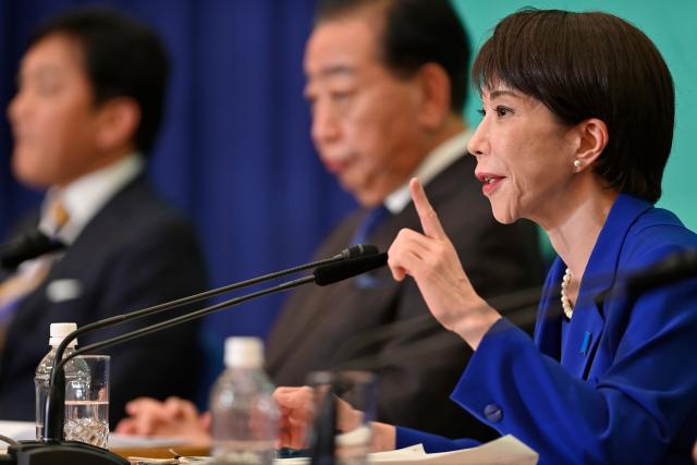 (260126) -- TOKYO, Jan. 26, 2026 (Xinhua) -- Japanese Prime Minister Sanae Takaichi speaks during a party leaders' debate in Tokyo, Japan, on Jan. 26, 2026. Takaichi said on Monday she would step down immediately if the ruling bloc fails to secure a majority in the upcoming House of Representatives election.
   Takaichi, who also serves as president of the ruling Liberal Democratic Party, made the remarks during a party leaders' debate on Monday. (David Mareuil/Pool via Xinhua)