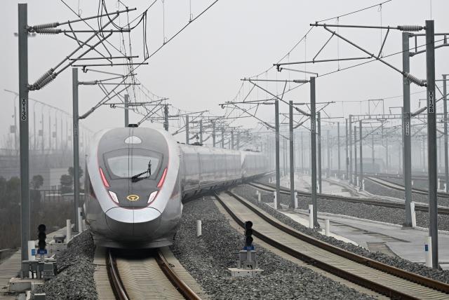 (260126) -- XI'AN, Jan. 26, 2026 (Xinhua) -- The first high-speed train from Yan'an to the capital city of Beijing departs from Xi'an North Railway Station in Xi'an, northwest China's Shaanxi Province, Jan. 26, 2026. The high-speed train G359 departed from Yan'an on Monday morning, marking the first direct connection of high-speed rail from the sacred revolutionary site to the nation's capital city of Beijing.
   The fastest high-speed train ride from Yan'an to Beijing will take five hours and 42 minutes, a big improvement compared to the original train. (Xinhua/Li Yibo)