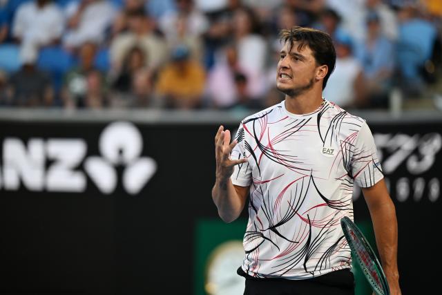 (260126) -- MELBOURNE, Jan. 26, 2026 (Xinhua) -- Luciano Darderi reacts during the men's singles 4th round match between Luciano Darderi of Italy and Jannik Sinner of Italy at the Australian Open tennis tournament in Melbourne, Australia, Jan. 26, 2026. (Photo by Wang Shen/Xinhua)