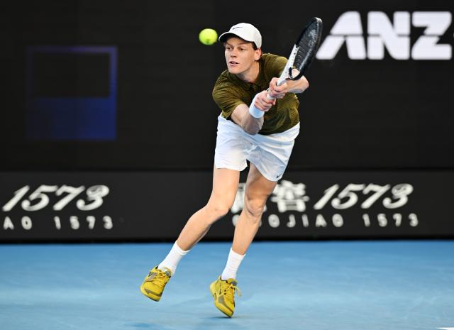 (260126) -- MELBOURNE, Jan. 26, 2026 (Xinhua) -- Jannik Sinner hits a return during the men's singles 4th round match between Luciano Darderi of Italy and Jannik Sinner of Italy at the Australian Open tennis tournament in Melbourne, Australia, Jan. 26, 2026. (Photo by Wang Shen/Xinhua)