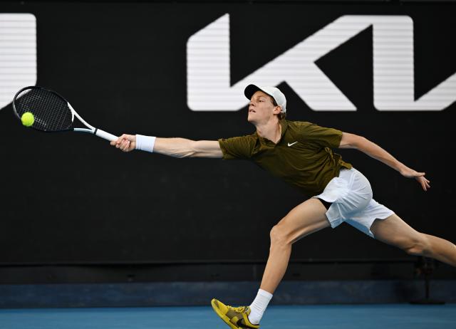 (260126) -- MELBOURNE, Jan. 26, 2026 (Xinhua) -- Jannik Sinner hits a return during the men's singles 4th round match between Luciano Darderi of Italy and Jannik Sinner of Italy at the Australian Open tennis tournament in Melbourne, Australia, Jan. 26, 2026. (Photo by Wang Shen/Xinhua)
