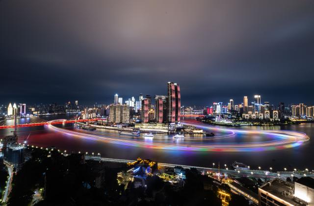 (260126) -- BEIJING, Jan. 26, 2026 (Xinhua) -- This photo taken on Oct. 22, 2025 shows the night view of Chongqing, southwest China. The combined economic output of southwest China's Sichuan Province and Chongqing Municipality has exceeded 10 trillion yuan (about 1.44 trillion U.S. dollar) in 2025, accounting for approximately 7.2 percent of the national total. (Xinhua/Chen Cheng)